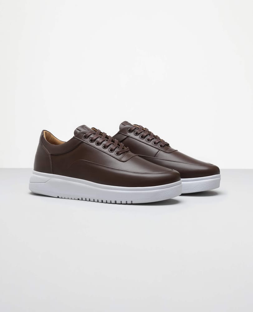 Tenis casual marrom RS7 vista lateral externa