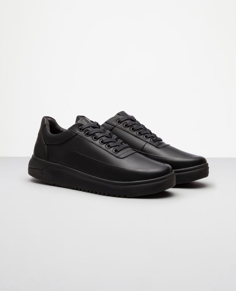 Tenis casual all black RS7 vista lateral externa