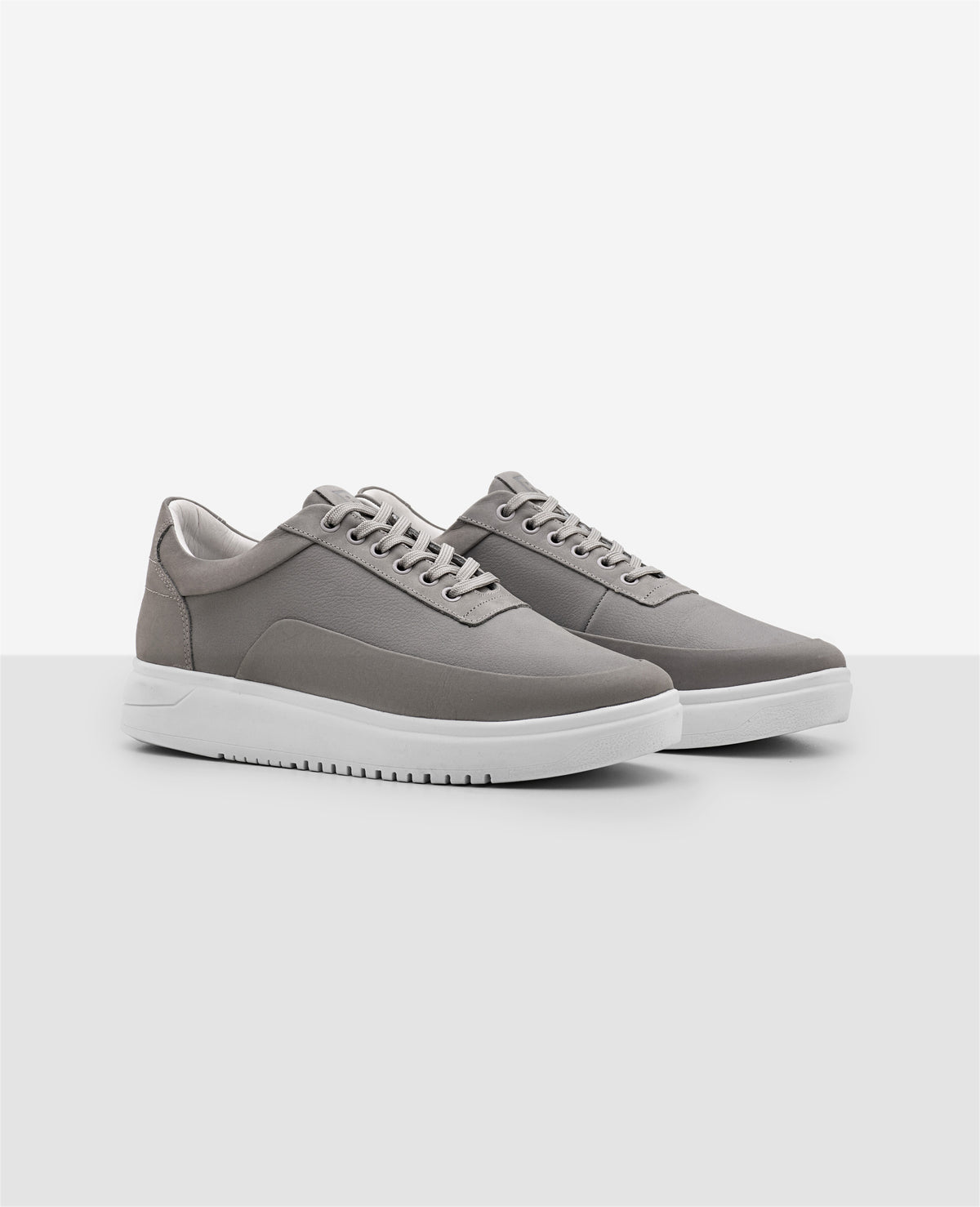 Tenis casual cinza RS7 vista lateral externa