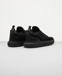 Tenis casual knit all black vista traseira do calcanhar