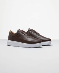 Tenis casual marrom RS7 vista lateral externa