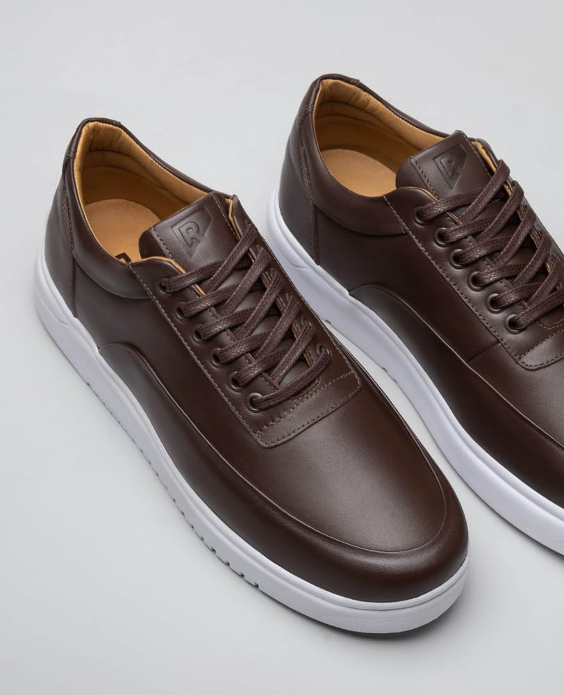 Tenis casual marrom RS7 vista superior do cabedal